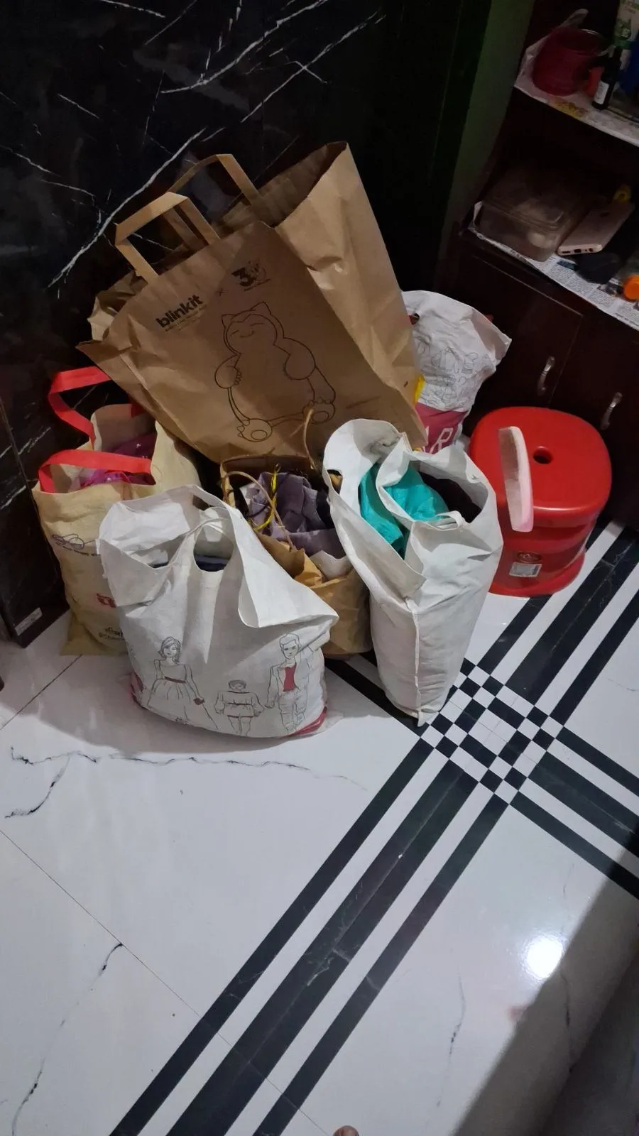 multiple bags of clothes — photo 2