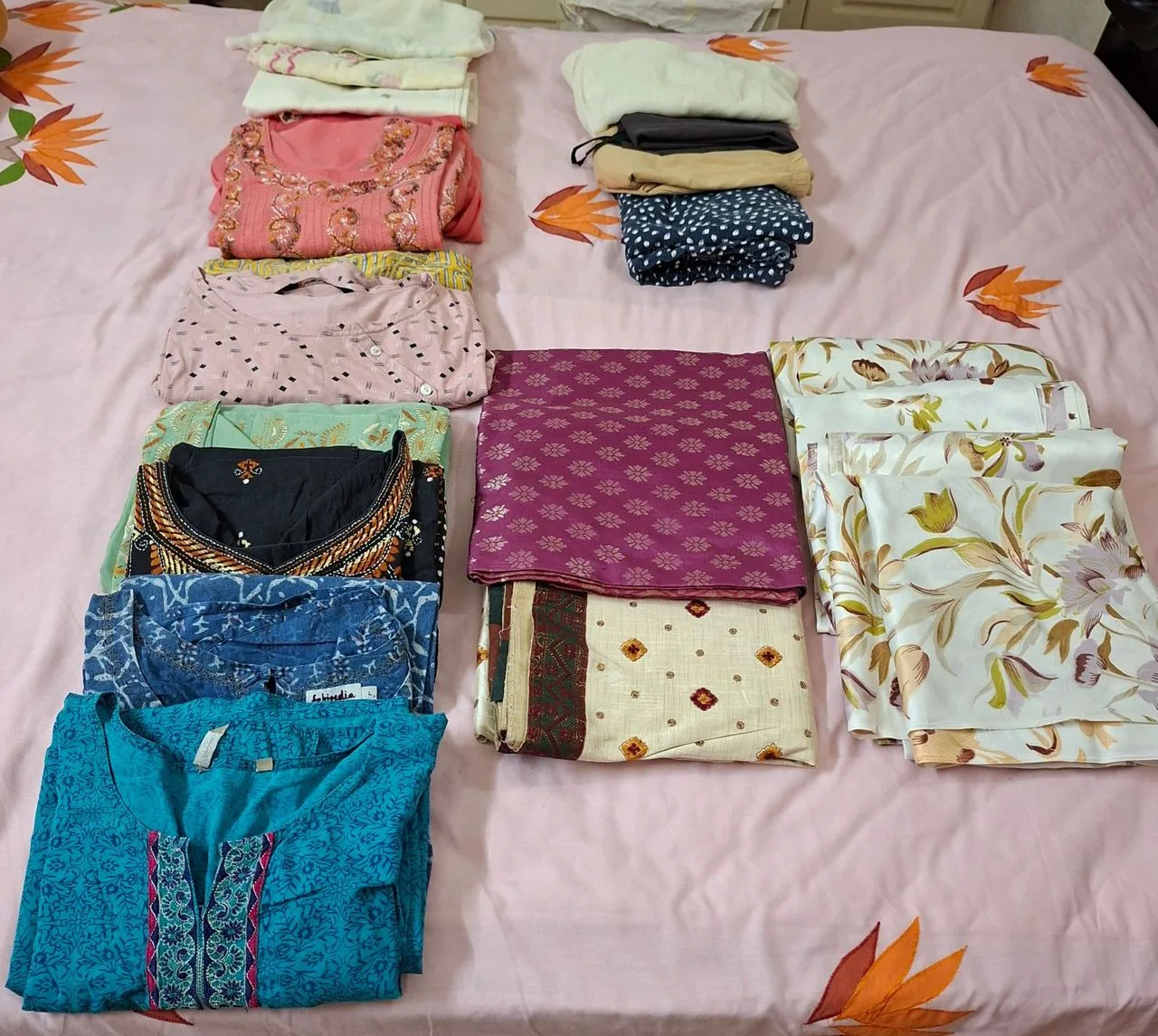 7-8 ladies tops, 3-4 lowers, 2 new silk sarees and 4 new curtains — Angamaly