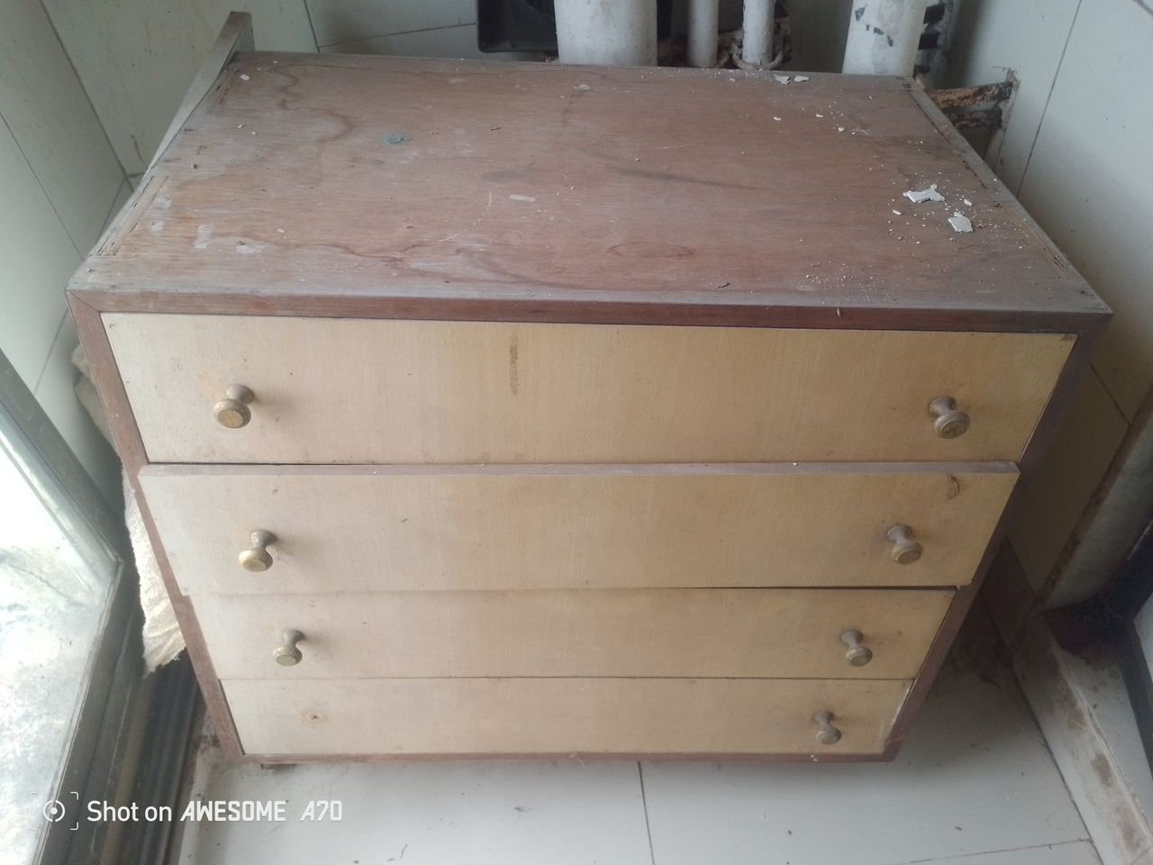 a cabinet with 4 drawers — photo 1
