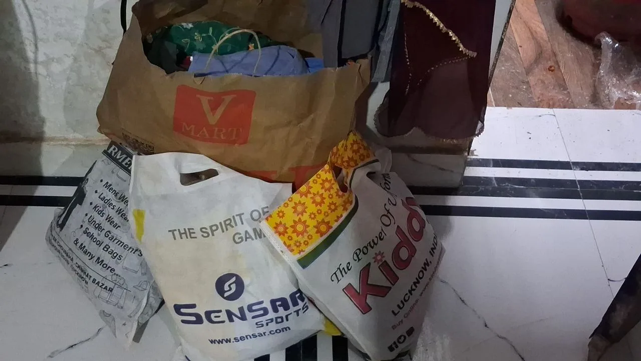multiple bags of clothes — Semra
